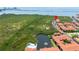 Aerial shot featuring a condominium complex next to a natural wetland and boardwalk at 4302 Bayside Village Dr # 102, Tampa, FL 33615