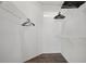 Walk-in closet with wood-look flooring and wire shelving at 4302 Bayside Village Dr # 102, Tampa, FL 33615