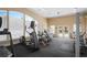 Fully equipped fitness center with modern cardio machines, weights, and views of the pool at 4302 Bayside Village Dr # 102, Tampa, FL 33615
