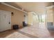 Outdoor hallway with neutral paint, sconces, and tile flooring at 4302 Bayside Village Dr # 102, Tampa, FL 33615