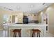 Open kitchenette area with counter seating and a full suite of appliances for easy meal preparation at 4302 Bayside Village Dr # 102, Tampa, FL 33615