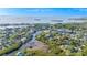 Beautiful aerial view of a coastal neighborhood with waterways and abundant greenery at 455 Alt 19 # 111, Palm Harbor, FL 34683