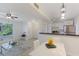 Inviting living space that opens to a modern kitchen with stainless steel appliances at 455 Alt 19 # 111, Palm Harbor, FL 34683
