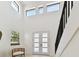 Bright entryway featuring contemporary furniture, frosted glass front door, and decor at 6315 S Richard Ave, Tampa, FL 33616