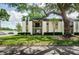 Multi-Gathering building with a large tree shading the front yard and entryway at 801 Russell Ln # 255, Brandon, FL 33510