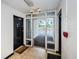 Interior hallway featuring tiled floors, apartment doors, exit sign and a welcome mat at 801 Russell Ln # 255, Brandon, FL 33510