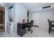 Office space that includes a desk and workspace, along with a washer and dryer at 801 Russell Ln # 255, Brandon, FL 33510