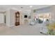 Spacious living room with neutral décor, large windows, and access to outdoor spaces at 8902 30Th E St, Parrish, FL 34219