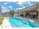Sparkling pool featuring access steps and a generous deck area, perfect for entertaining at 8902 30Th E St, Parrish, FL 34219