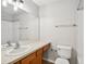 Standard bathroom featuring a large mirror, single sink vanity, tile floors, and bathtub with shower at 10407 Westpark Preserve Blvd, Tampa, FL 33625