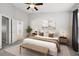 Bedroom with ensuite bathroom with soaking tub and shower and neutral finishes at 10407 Westpark Preserve Blvd, Tampa, FL 33625