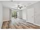 Bright living room with access to lanai through sliding glass doors at 10407 Westpark Preserve Blvd, Tampa, FL 33625