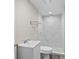 Bathroom featuring new vanity and toilet plus walk-in shower with modern tile and fixtures at 1209 E 29Th Ave, Tampa, FL 33605