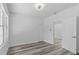 A minimalist bedroom featuring modern flooring, recessed lighting, closet, and plenty of natural light at 1209 E 29Th Ave, Tampa, FL 33605