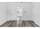 Bedroom showcasing wood floors and an open doorway at 1209 E 29Th Ave, Tampa, FL 33605