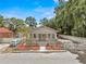 Charming single-story home with a well-manicured front yard and cozy, inviting curb appeal at 1209 E 29Th Ave, Tampa, FL 33605