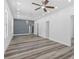 Inviting living room showcasing modern flooring, neutral walls, recessed lighting and lots of natural light at 1209 E 29Th Ave, Tampa, FL 33605
