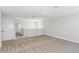 Bright loft area features neutral decor, carpet flooring, and ample natural light at 12156 Cattleside Dr, Riverview, FL 33579