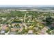 Aerial perspective of the property located in a community setting with nearby lakes and convenient roadways at 12506 Safari Ln, Riverview, FL 33579
