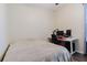 Bedroom with hardwood floors, a bed, a desk, and a computer at 12506 Safari Ln, Riverview, FL 33579