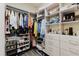 Walk-in closet with shelves, clothes and shoe storage at 12506 Safari Ln, Riverview, FL 33579