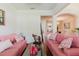 Open concept living area with hardwood floors and views into the dining room at 12506 Safari Ln, Riverview, FL 33579