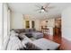 Living room boasts sectional sofa, view of dining area and eat-in kitchen at 12506 Safari Ln, Riverview, FL 33579