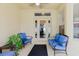 Inviting outdoor patio featuring comfortable seating with blue cushions, ideal for entertaining at 12506 Safari Ln, Riverview, FL 33579