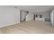 Open floor plan with seamless flow between living room and kitchen areas at 13014 Wellspring Dr, Lithia, FL 33547
