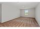 Large bedroom with carpeted floor and bright window with a view at 14773 Summer Branch Dr, Lithia, FL 33547