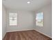 This bedroom features neutral paint, carpet, and ample natural light, creating a serene space at 14773 Summer Branch Dr, Lithia, FL 33547
