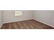 This bedroom features neutral paint, carpet, and ample natural light, creating a serene space at 14773 Summer Branch Dr, Lithia, FL 33547