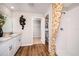 Well-lit bathroom with double sink vanity, shower, and modern fixtures at 14781 Summer Branch Dr, Lithia, FL 33547