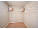 Walk-in closet with ample storage space and shelving at 14781 Summer Branch Dr, Lithia, FL 33547