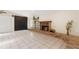 Bright living room with tile floors and a brick fireplace at 1509 Coachlight Way, Dunedin, FL 34698