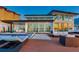 Stunning waterfront home with modern design, outdoor entertaining spaces, and panoramic water views at 16496 Redington Dr, Redington Beach, FL 33708