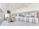 Bright, open-concept kitchen featuring a breakfast bar and modern appliances for contemporary living at 16496 Redington Dr, Redington Beach, FL 33708