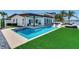 The pool area has a spa and waterfront access, perfect for relaxation and entertaining at 16496 Redington Dr, Redington Beach, FL 33708