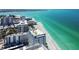 Stunning aerial view of the beachfront condo building with private beach access at 1750 Benjamin Franklin Dr # 11G, Sarasota, FL 34236