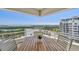 Relax on this balcony with beautiful scenery and water views at 1750 Benjamin Franklin Dr # 11G, Sarasota, FL 34236