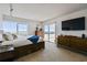 Spacious main bedroom with a comfortable king-size bed, a view of the city and neutral walls at 1750 Benjamin Franklin Dr # 11G, Sarasota, FL 34236