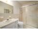 The bathroom is a bright, light color with a standing shower at 2286 Norwegian Dr # 66, Clearwater, FL 33763