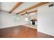 An open-concept living space connects the laminate-floored living room to the adjacent kitchen at 2286 Norwegian Dr # 66, Clearwater, FL 33763