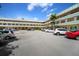 View of the parking lot with ample spaces with building views at 2286 Norwegian Dr # 66, Clearwater, FL 33763