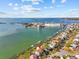 Stunning waterfront home with a private boat dock and panoramic views of the bay at 2402 Baywood W Dr, Dunedin, FL 34698