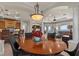 Open concept dining and living space with waterfront views at 2402 Baywood W Dr, Dunedin, FL 34698