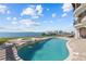 Relax in the outdoor pool and enjoy scenic views from this luxurious home at 2402 Baywood W Dr, Dunedin, FL 34698