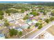 A high-angle aerial perspective showcases the property's location and proximity to neighborhood amenities and roadways at 2605 Fulton Sw St, Largo, FL 33774