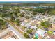 Bird's eye view highlighting the property's neighborhood location among tree-lined streets, and community amenities at 2605 Fulton Sw St, Largo, FL 33774