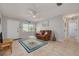 Cozy living room with comfortable seating, stylish décor, and ample natural light at 2605 Fulton Sw St, Largo, FL 33774